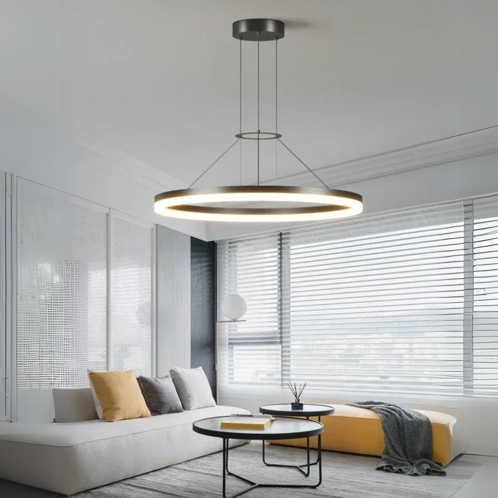A modern pendant lamp providing ambient lighting in a contemporary kitchen setting
